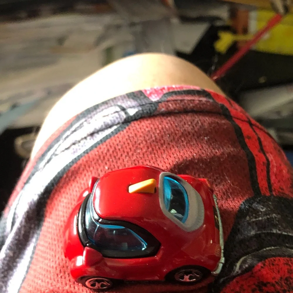 Red Toy Car with Blue Windshield